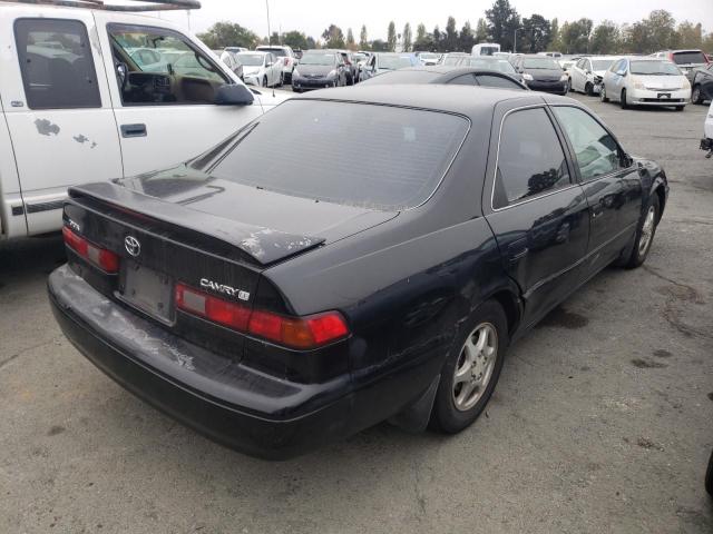 4T1BG28K7XU575233 - 1999 TOYOTA CAMRY CE BLACK photo 4