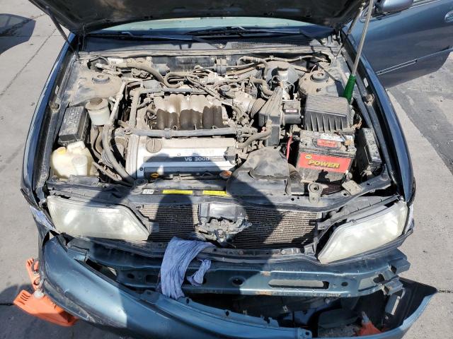 JN1CA21D5VT833678 - 1997 NISSAN MAXIMA GLE GREEN photo 7