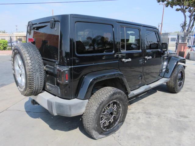 1C4BJWEG5DL657153 - 2013 JEEP WRANGLER U BLACK photo 4
