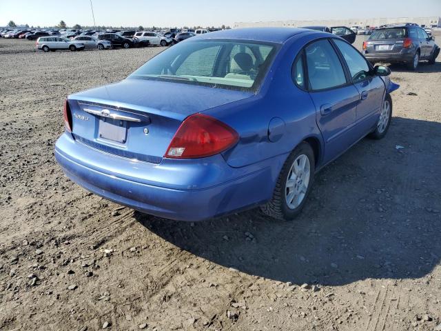 1FAFP52U72G246207 - 2002 FORD TAURUS LX BLUE photo 4