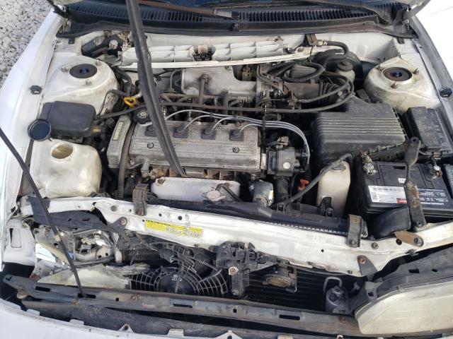 1NXBB02E8VZ640996 - 1997 TOYOTA COROLLA DX WHITE photo 7