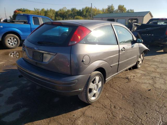 1FAFP31N27W187756 - 2007 FORD FOCUS ZX3 GRAY photo 4