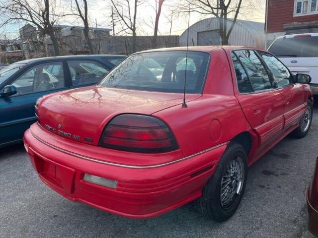 1G2NE54N4PM568513 - 1993 PONTIAC GRAND AM S RED photo 4