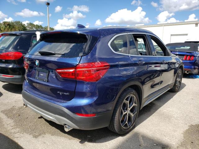 WBXHT3C34J5L32080 - 2018 BMW X1 XDRIVE2 BLUE photo 4