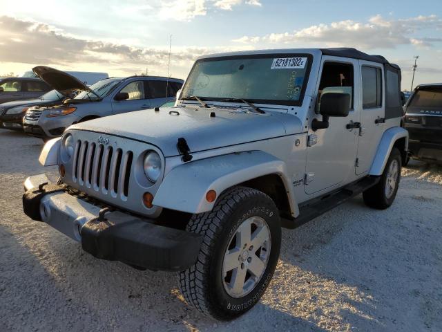 1J4HA5H10AL115427 - 2010 JEEP WRANGLER U SILVER photo 2