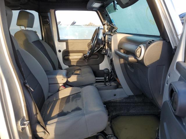 1J4HA5H10AL115427 - 2010 JEEP WRANGLER U SILVER photo 5