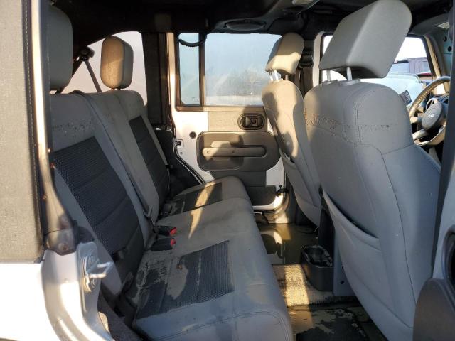 1J4HA5H10AL115427 - 2010 JEEP WRANGLER U SILVER photo 6