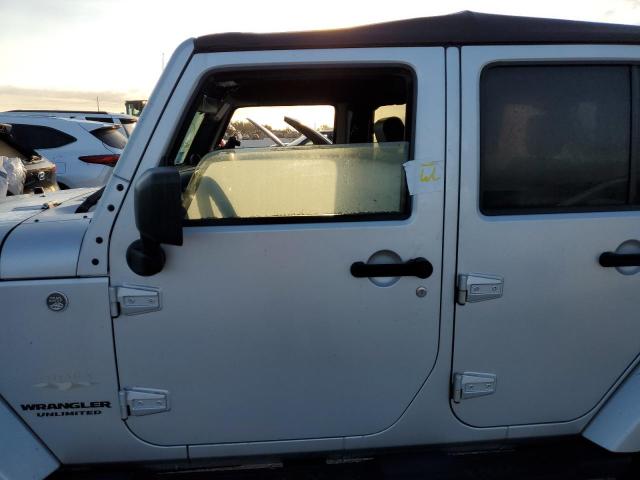 1J4HA5H10AL115427 - 2010 JEEP WRANGLER U SILVER photo 9