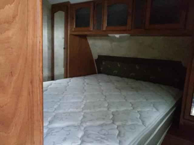 4YDT25124CT410403 - 2012 KEYSTONE PASSPORT WHITE photo 6