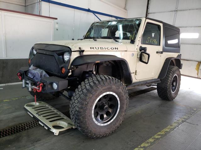 1J4BA6D16BL582905 - 2011 JEEP WRANGLER R CREAM photo 2