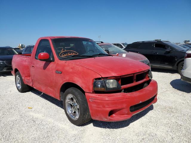 2FTZF0734YCA94751 - 2000 FORD F150 SVT L RED photo 1