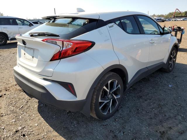 NMTKHMBX7MR137277 - 2021 TOYOTA C-HR XLE WHITE photo 4