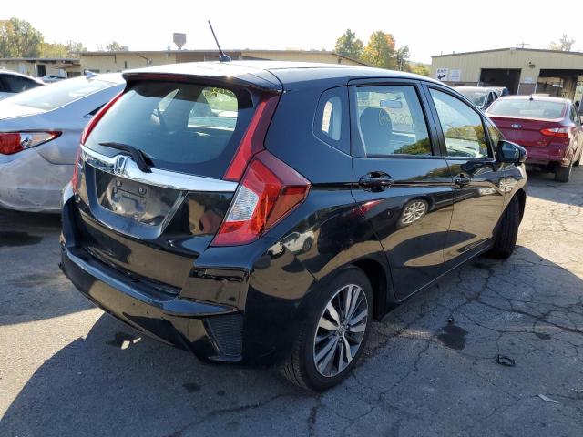 JHMGK5H72GX028972 - 2016 HONDA FIT EX BLACK photo 4