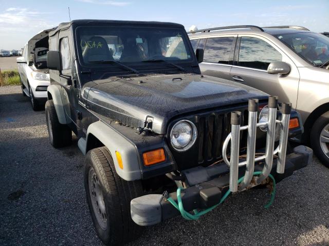 1J4FA29PXYP706683 - 2000 JEEP WRANGLER BLACK photo 1