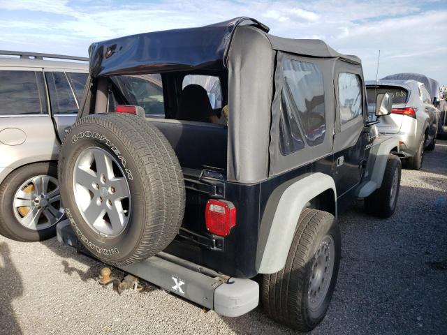 1J4FA29PXYP706683 - 2000 JEEP WRANGLER BLACK photo 4