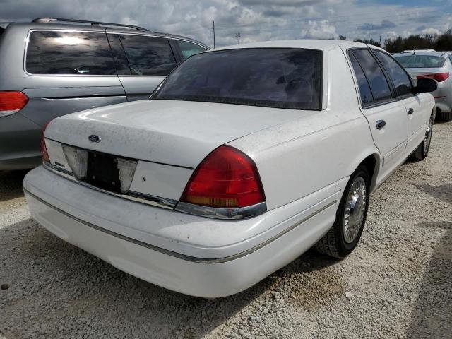 2FAFP73W2YX149544 - 2000 FORD CROWN VICT WHITE photo 4