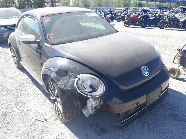 3VWVA7AT0CM605784 - 2012 VOLKSWAGEN BEETLE TUR BLACK photo 1