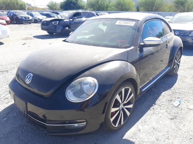 3VWVA7AT0CM605784 - 2012 VOLKSWAGEN BEETLE TUR BLACK photo 2