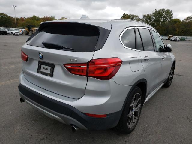 WBXHT3Z32H4A55942 - 2017 BMW X1 XDRIVE2 SILVER photo 4