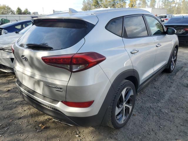 KM8J3CA21GU054631 - 2016 HYUNDAI TUCSON LIM SILVER photo 4