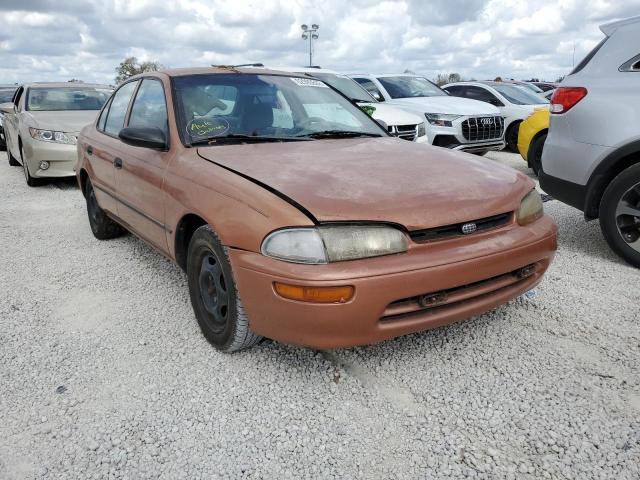 1Y1SK5263VZ436518 - 1997 GEO PRIZM BASE ORANGE photo 1