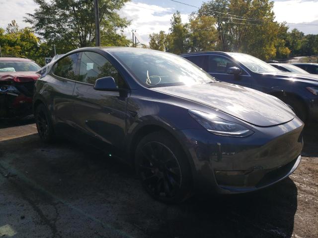 7SAYGDEE7NF320910 - 2022 TESLA MODEL Y رمادي صورة 1