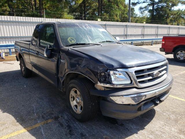 1FTZX1722YNA79766 - 2000 FORD F150 BLUE photo 1