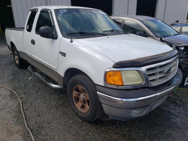 2FTRX172X4CA50208 - 2004 FORD F-150 HERI WHITE photo 1