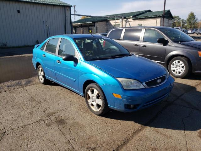 1FAHP34NX7W184947 - 2007 FORD FOCUS ZX4 BLUE photo 1