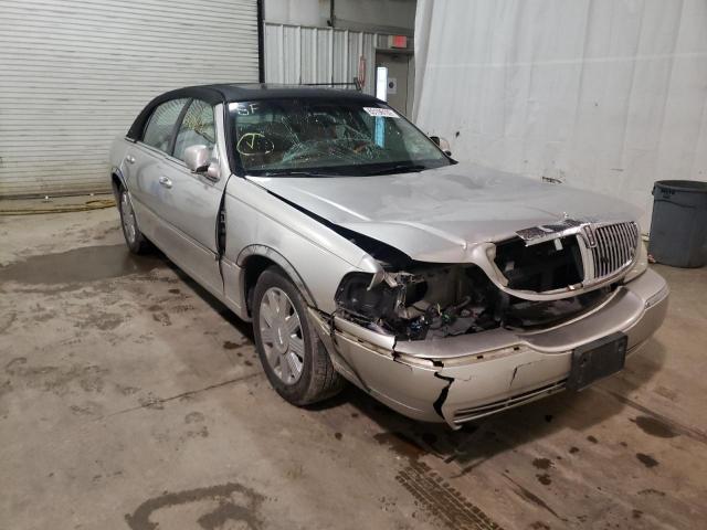 1LNHM83W74Y625567 - 2004 LINCOLN TOWN CAR U SILVER photo 1