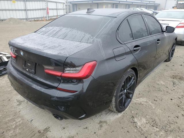 WBA5R7C5XKAJ80576 - 2019 BMW 330XI BLACK photo 4