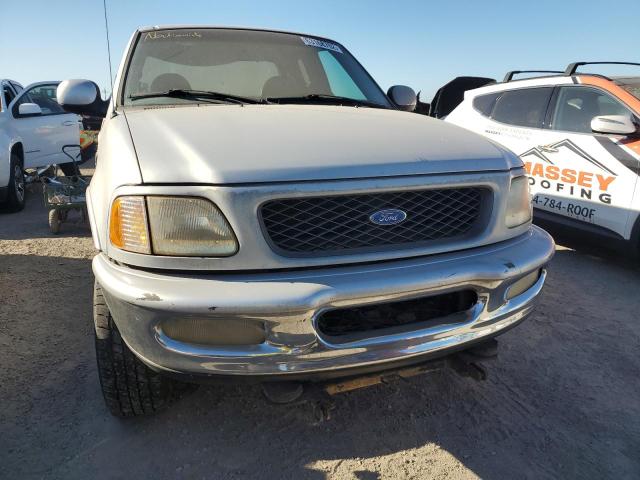 1FTDX18W7VNC87228 - 1997 FORD F150 SILVER photo 9