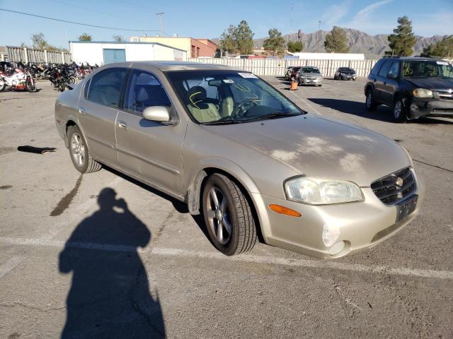 JN1CA31A11T100629 - 2001 NISSAN MAXIMA GXE GOLD photo 1