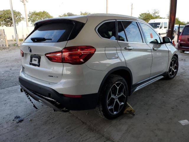 WBXHT3C30J5L29466 - 2018 BMW X1 XDRIVE2 WHITE photo 4