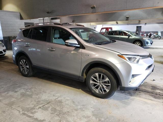 JTMRJREVXJD193412 - 2018 TOYOTA RAV4 HV LE SILVER photo 4