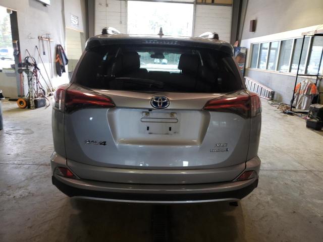 JTMRJREVXJD193412 - 2018 TOYOTA RAV4 HV LE SILVER photo 6