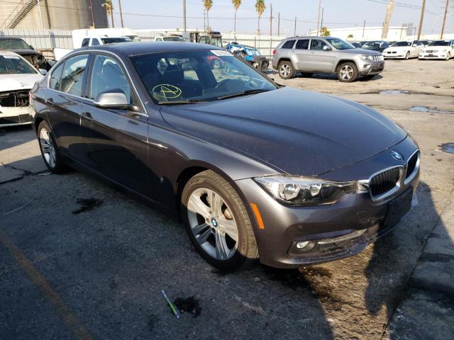 WBA8E1C37HA156362 - 2017 BMW 330E GRAY photo 1