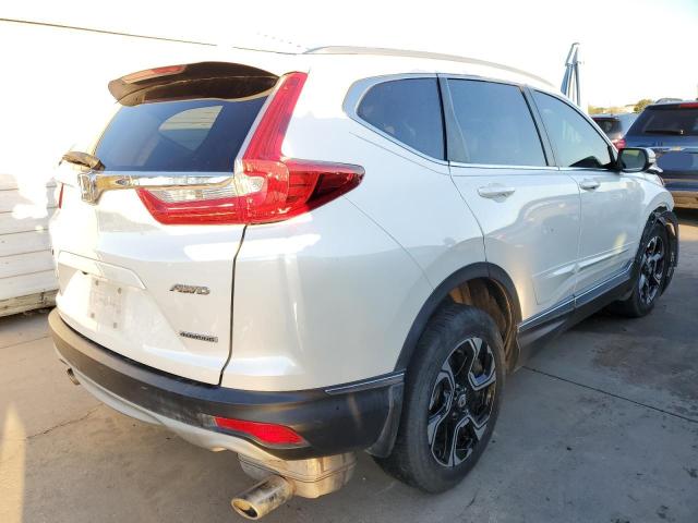 2HKRW2H94HH676924 - 2017 HONDA CR-V TOURI WHITE photo 4