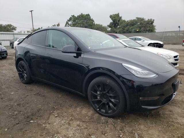 7SAYGDEE4NF480954 - 2022 TESLA MODEL Y Черный фото 4