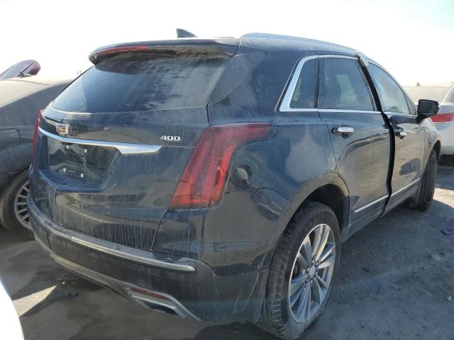 1GYKNCRS8MZ208459 - 2021 CADILLAC XT5 PREMIU BLUE photo 4