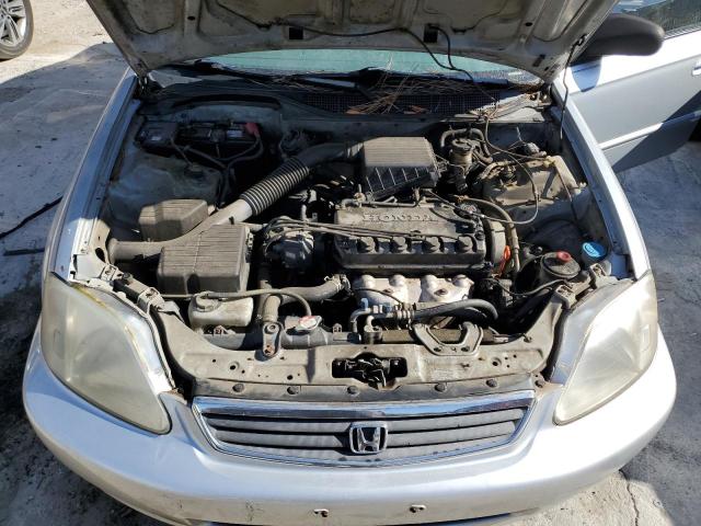 2HGEJ6619YH566074 - 2000 HONDA CIVIC BASE SILVER photo 7