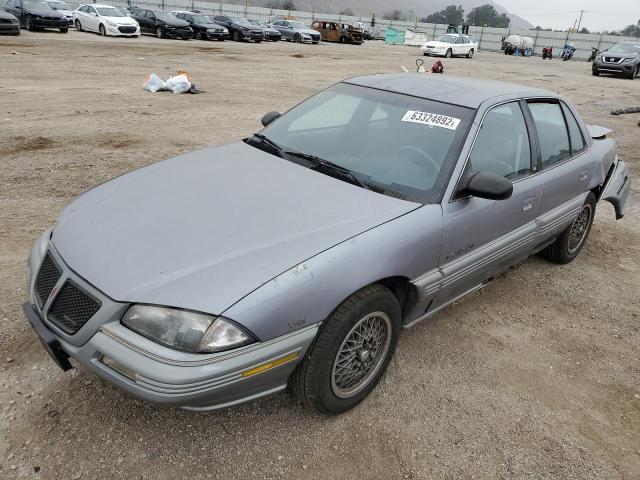 1G2NE54NXNM066084 - 1992 PONTIAC GRAND AM S BLUE photo 2