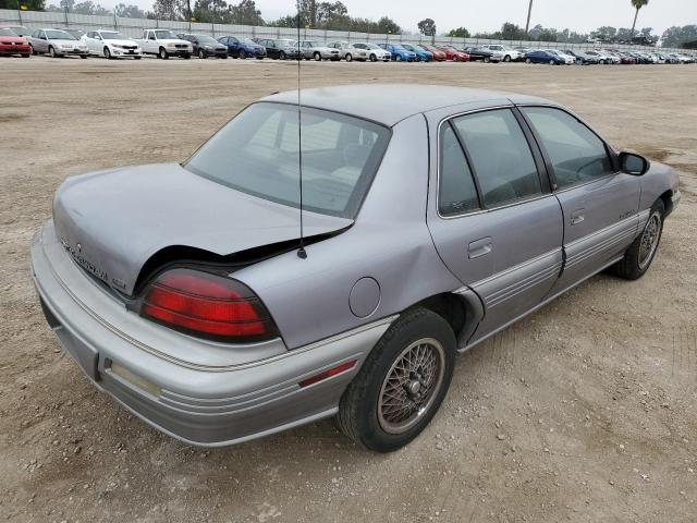 1G2NE54NXNM066084 - 1992 PONTIAC GRAND AM S BLUE photo 4