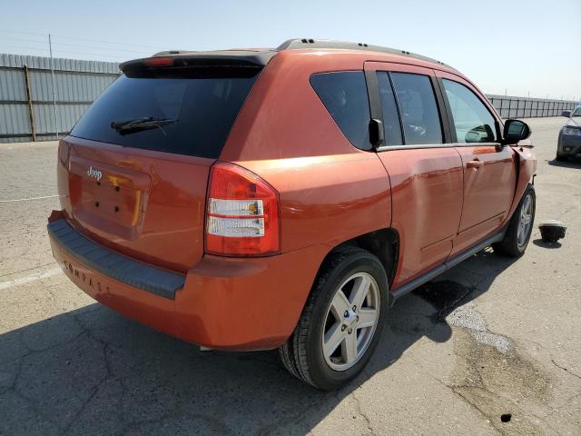 1J4NT4FB0AD611941 - 2010 JEEP COMPASS SP ORANGE photo 4