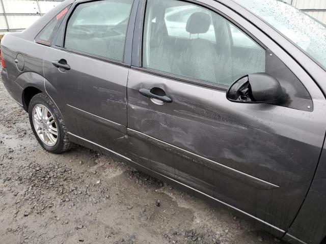 1FAFP34N67W270621 - 2007 FORD FOCUS ZX4 GRAY photo 9