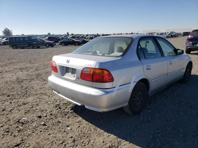 2HGEJ6611YH523090 - 2000 HONDA CIVIC BASE SILVER photo 4