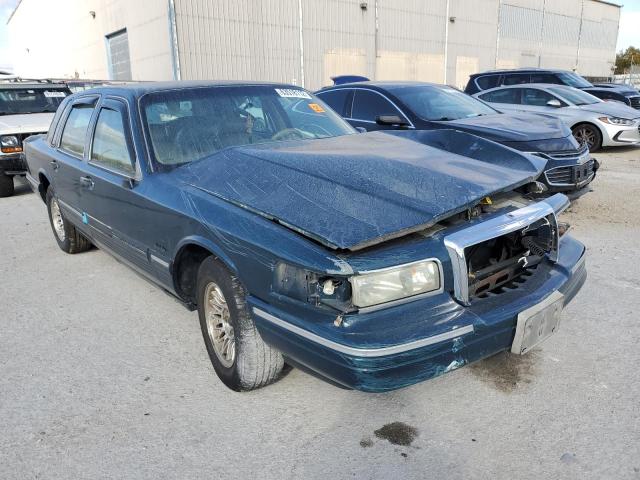 1LNLM81W7VY610310 - 1997 LINCOLN TOWN CAR E TEAL photo 1