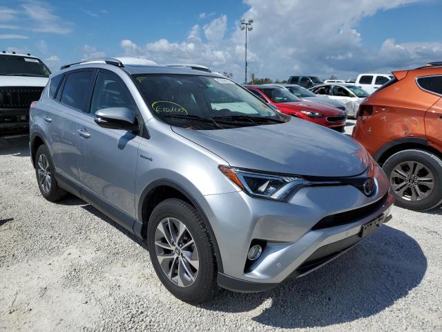 JTMRJREV7JD170797 - 2018 TOYOTA RAV4 HV LE SILVER photo 1