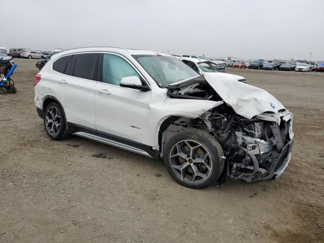 WBXHT3C31J5L25409 - 2018 BMW X1 XDRIVE2 WHITE photo 4