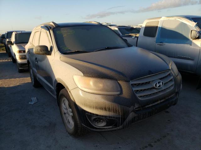 5XYZGDAB9CG125720 - 2012 HYUNDAI SANTA FE G BLACK photo 1